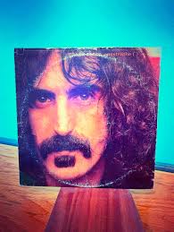 ⚡️Pre-Loved Wednesday drop! That's Miles holding up “Songs In The Key of  Life”, and that's one of his paintings behind him. We have several of his  works for sale, which all come