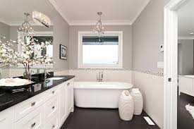 White bathroom beadboard make a small space appear larger and refreshes the look of a room. Vancouver White Beadboard Bathroom Contemporary With Trim Wall And Floor Tiles