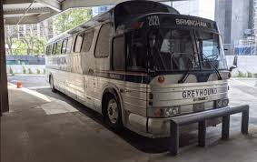 Image result for Silver 1990 Greyhound Bus