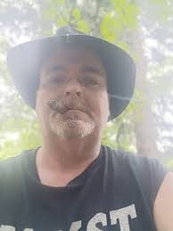 Old Friends Two friends Catching up to now Over a drink and cigar Smoke  mixing with the moonlight Laughter tipping over From the night's edge As  they recall old times melting Under