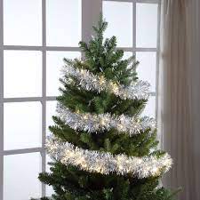 Wide cut orange tinsel combines with thin black tinsel creating fullness and texture. 12 Led Silver Tinsel Garland Mr Christmas