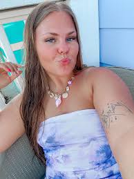 Wearing my fav charm necklace🐚💜