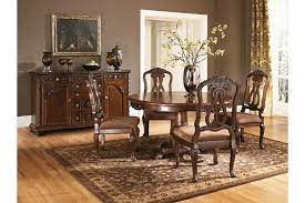 Our main dining room allows you and your guests to savor our fine cuisine while enjoying the panoramic views of the long island sound. Dark Brown North Shore Dining Room Server View 4 Round Dining Room Sets Ashley Furniture Dining Ashley Furniture Dining Room