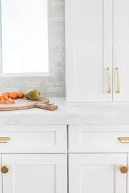 Costa Mesa Beach Cottage Project Kitchen Homedesign Interiordesign Designinspo White Shaker Cabinets White Shaker Kitchen Cabinets Gold Kitchen Hardware