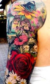 Bird And Rose Tattoo For Men Girls Tattoos Sleeve Tattoos Idea Using Flower Butterfy And Bird Tattoos Idea Flower And Butterfly Tatto Colorful Flower Tattoo Tattoos Daisy Tattoo Designs