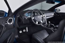 Image result for Dark Ming Blue 2004 Pontiac