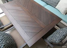 Diy plywood strip desk when sarah found herself with a heap of unused plywood piling up in her basement, she hatched an extraordinary idea. Split Herringbone Patio Tabletop Deeplysouthernhome