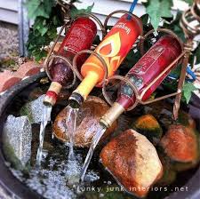 40 Diy Wine Bottle Projects And Ideas You Ought To Undoubtedly Attempt Ikea Decoration Weinflaschen Brunnen Wasserspiel Garten Basteln Mit Flaschen