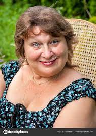 Mature Plump Woman In Park Smiling And Looking At The Camera Stock Photo By C Ramvseb 318314292