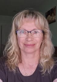 What hairstyle would you recommend for a 70-year-old woman with thin and  thinning hair and wide shoulders?