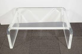 This transparent new surface floats in the room without taking up permanent visual residency. Mid Century Thick Lucite Waterfall Form Coffee Table At 1stdibs