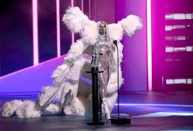 Womens prisoner of love costume. How Lady Gaga Won The Vmas With Her Co Ordinated Outfits And Masks Vogue Paris