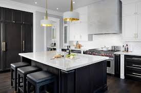 White And Brown Kitchen Features White Upper Cabinets And Espresso Stained Lower Cabinets Adorne Brown Kitchens Stained Kitchen Cabinets Brown Kitchen Cabinets