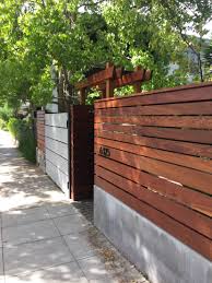 Wood Metal And Concrete Fence Wood Fence Design Privacy Fence Designs Fence Design