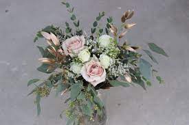Bridesmaids Bouquet Quicksand Roses White Lisianthus Gold Tinted Italian Ruscus Eucalyptus Baby S Breath Bridesmaid Bouquet Wedding Bouquets Wax Flowers