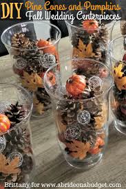 Diy Pine Cones And Pumpkins Fall Wedding Centerpieces A Bride On A Budget