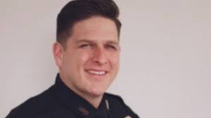 Funeral service remembers fallen Sgt. Christopher Brewster as a gardener,  musician, friend