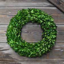 Pieces can either be wrapped around entire form or woven through the grapevine branches. 22 Inch Preserved Boxwood Garden Wreath