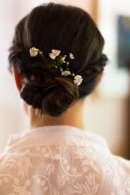 The shrub may grow to around 15 feet, and many hybrids have been developed that you can enjoy. Small White Flowers In Updo Hairstyle