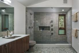 This brushed pewter vanity fixture is ideal over your bathroom mirror and can be installed as an up or down light. 75 Beautiful Pebble Tile Floor Doorless Shower Pictures Ideas July 2021 Houzz