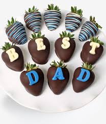 Pair a flower bouquet with a box of divine chocolate dipped strawberries and other treats, such as banana bites dipped in white and semisweet chocolate and apple wedges covered in semisweet chocolate. Chocolate Covered Company Best Dad Berry Gram