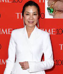 The Stunning Emerald Engagement Ring In Crazy Rich Asians Is From Michelle Yeoh S Personal Jewelry Collection Crazy Rich Asians Michelle Yeoh Emerald Engagement