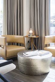 A Renaissance For Hotel Design Thou Swell Silver Coffee Table Hammered Coffee Table Ottoman Table