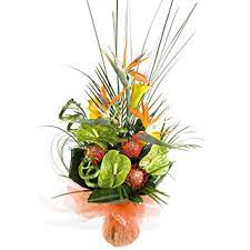 Our range of paper, plastic and silk flowers are perfect for a handmade wedding or low maintenance floral arrangements around the home. Exotic Tropical Flower Arrangement Flower Bouquet Flowers Delivered Anywhere In The Uk