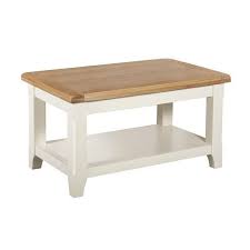Three flat black metal bar legs curve gracefully up and clamp the round tabletop for a subtle industrial influence. Harmony White Small 1 Shelf Coffee Table Buy Online At Qd Stores