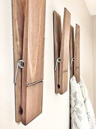 Giant Clothes Pins Instead Of Hooks Is Such A Genius Way Of Mixing Wall Decor With Practicality Laundry Room Decor Laundry Decor Kids Drawings Display
