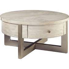 This tufted, square ottoman is a great piece to round out your living room ensemble. Urlander Round Lift Top Cocktail Table Ashley Homestore Canada