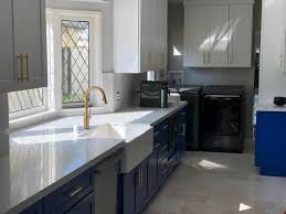 The two colors contrast perfectly, reinforcing the freshness and relaxing nature of blue. Kitchen Remodel San Marino Shaker Two Tone Blue Mtd Kitchen