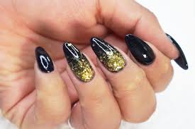 Next, we have a cute black and gold idea. Black Ombre Nails With Gold Glitter Using Dip Powder Dipwell