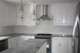 No matter your kitchen style or the shade of gray cabinetry you choose, a white countertop will not clash with your gray kitchen cabinets. I Ve Kept You Waiting Long Enough Kitchen Remodel Countertops Gray Kitchen Countertops Grey Granite Countertops