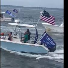 Trump boat parade appears to sink nearby vessel swamped by waves. Hundreds Of Boats Join Pro Trump Parade Off Long Island Ahead Of Rnc