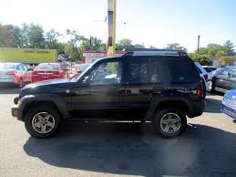 Image result for Brilliant Black 2005 Jeep