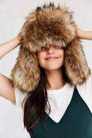 50 Cozy Fashion Gifts That Ll Give You That Warm And Fuzzy Feeling Inside In 2021 Fur Trapper Hat Trapper Hats Fur Trapper