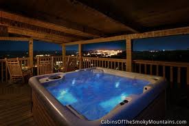 A Cabin Overlooking The Mountains And The Winterfest Lights Of Pigeon Forge All From The Hot Tub Not Bad Cabin Pigeon Forge Cabins Pet Friendly Cabins