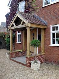 Building a porch roof guide learn the basic steps. 40 Lovely Door Overhang Designs Bored Art Front Porch Design Porch Design Front Door Porch