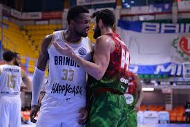 Milan's Nick Perkins playing professional basketball in Italy