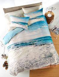 Dance with colorful mermaids and dream of salty seas with this quilt set. Beach Bedding Collections Slip Away To The Soothing Shoreline Beach Bliss Living Beach Themed Bedroom Beach Bedding Beach Themed Room