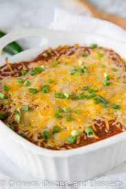 After layering, place dish in the preheated oven and bake for 45 minutes to 1 hour, until cheese starts to brown and bubble. Stacked Chicken Enchiladas Dinners Dishes And Desserts