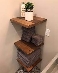 Floating shelves, installed with concealed brackets, update underused walls with streamlined storage and display space. Porter Barn Wood On Instagram Floating Corner Shelves Photo By Jessefitton Bathroo Corner Shelves Floating Corner Shelves Reclaimed Wood Shelves Bathroom