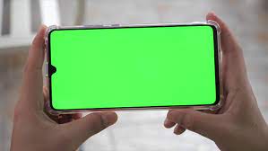 This is mostly green or it may look like a phone sitting up. Close Up Horizontal Hands Holding Stock Footage Video 100 Royalty Free 1054805630 Shutterstock