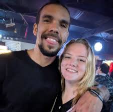 Man singing songs to girlfriend in car?