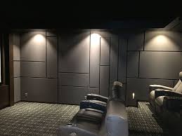 Modern Home Theater Design Featuring A Geometric Acoustic Panel Design Home Theater Rooms Home Theater Design Home Theater Seating