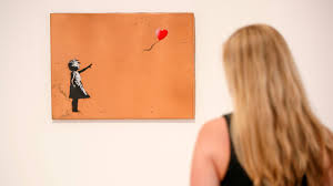 Banksy's video begins with the caption. Buyer Goes Ahead With 1 4m Purchase Of Shredded Banksy Artwork