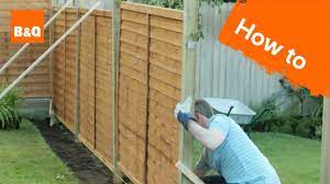 Putting up a garden fence. How To Erect A Fence Youtube
