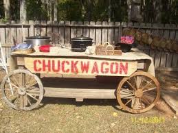 Chuckwagon Bbq Decorating Ideas Took An Old Wooden Table Add Wheels And A Sign Our Chuck Cowboy Theme Party Western Theme Party Cowgirl Party