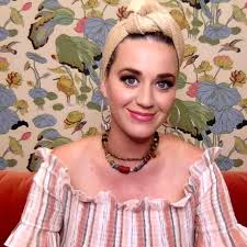 Katy seemed to be in good spirits as she laughed and gave the peace sign as she was making her way out of terminal 3. Katy Perry Shows Off Baby Gifts From Beyonce And Uncle Lionel Richie Gma